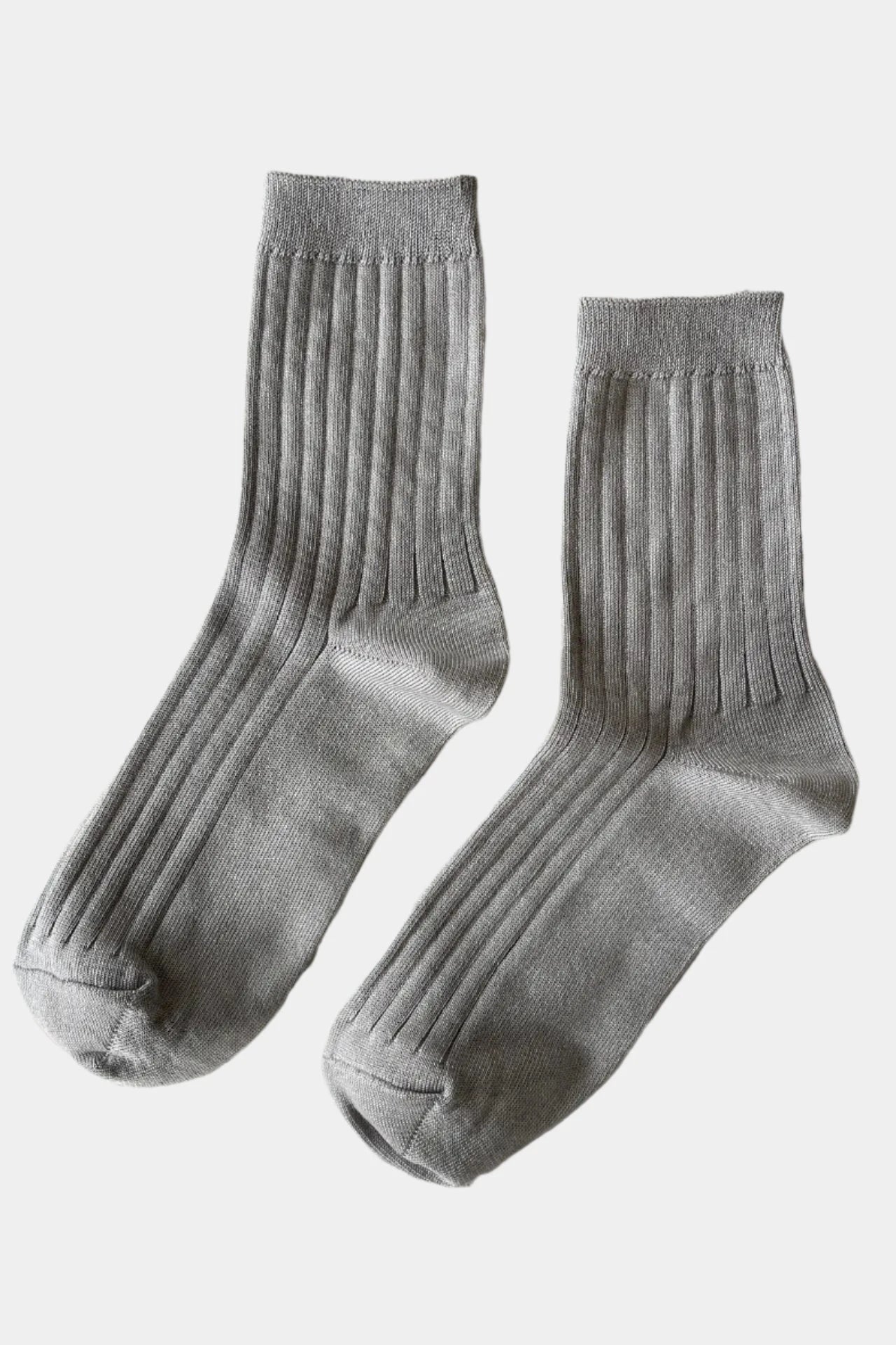 her socks in stone laying flat