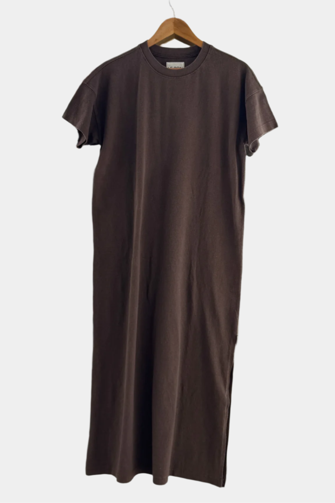 her dress in chocolate hanging on a wooden hanger