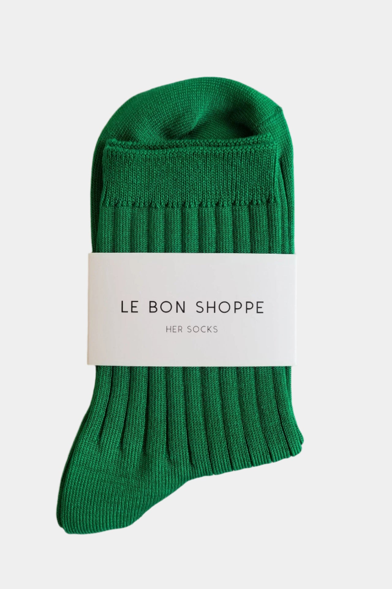 Her sock in kelly green