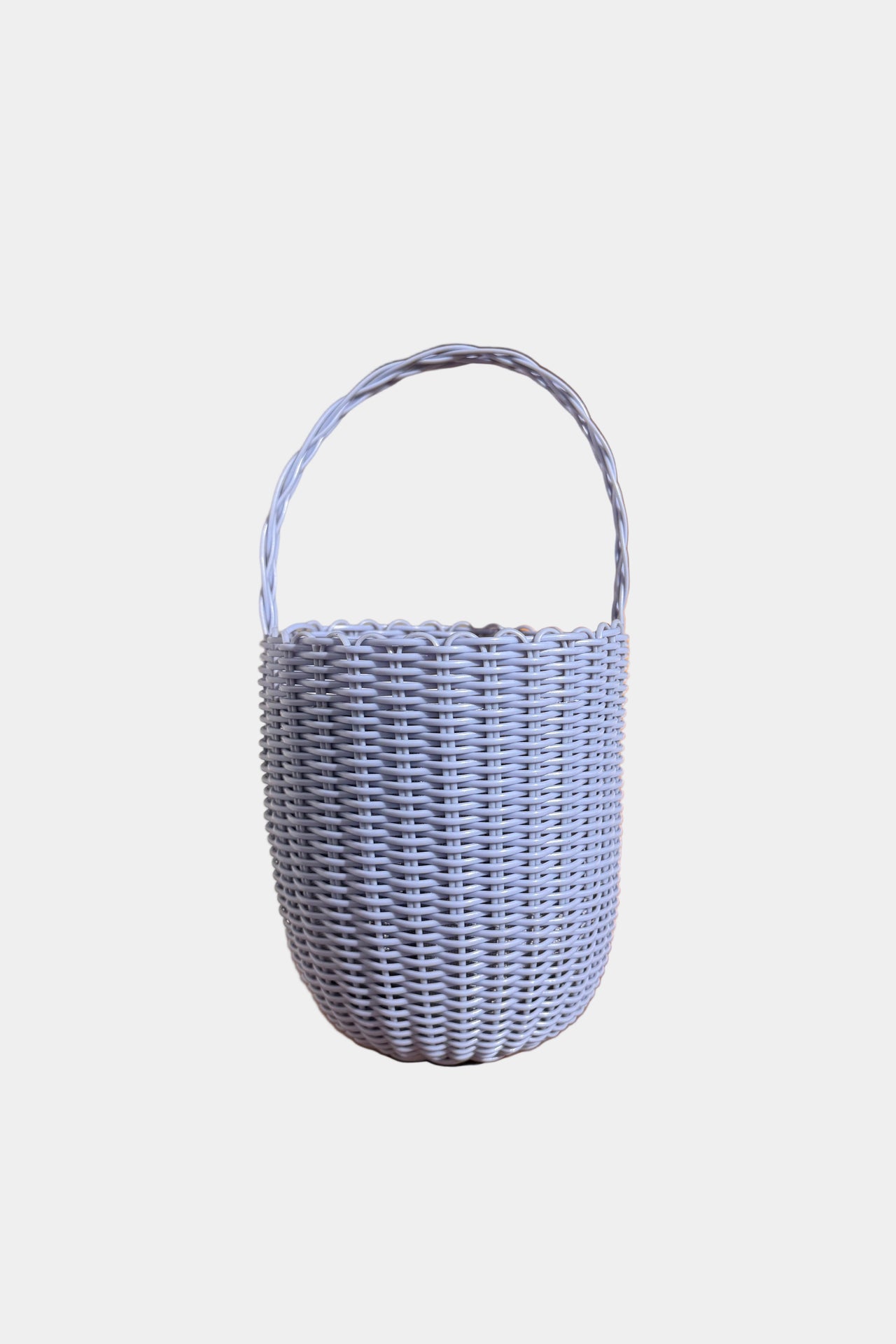 Lilac woven mini bucket bag displayed against a white background