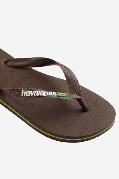 Brown sandal with 'Havaianas' logo on a white background