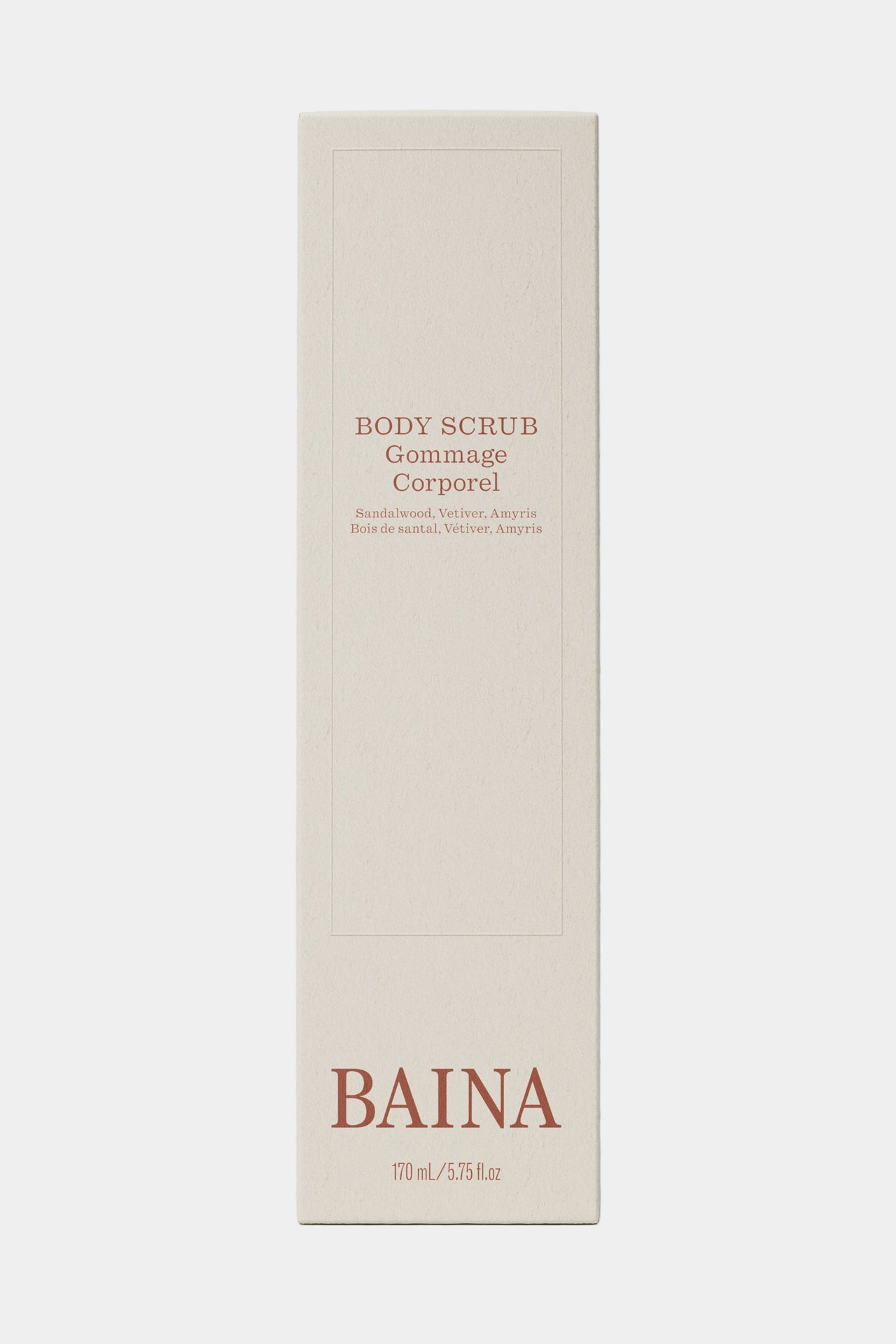 Silver tube of Baina body scrub on a light gray background