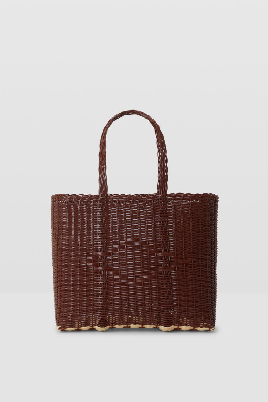 Woven brown handbag on a light gray background