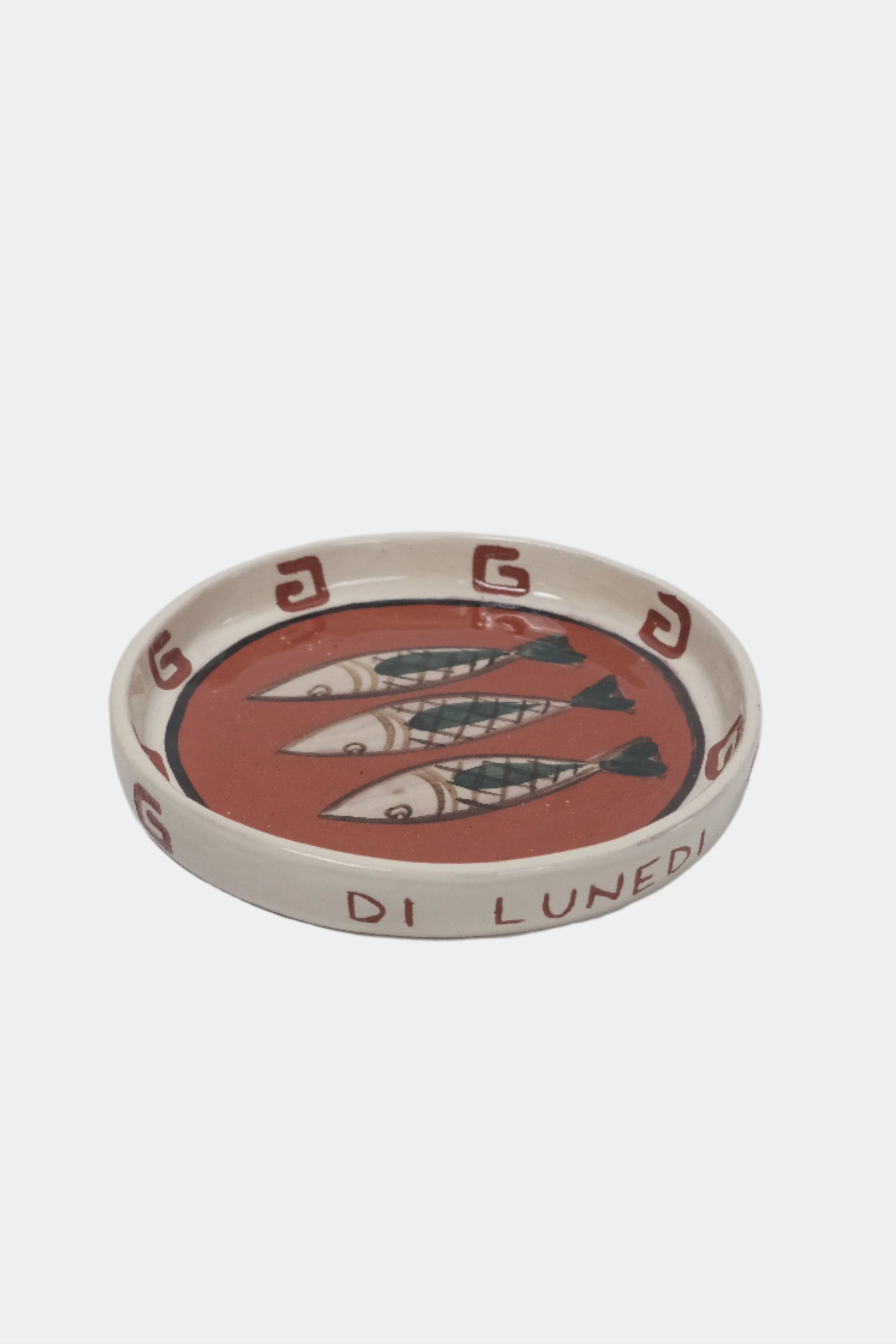 top side view of terracota plate with fish illustrations