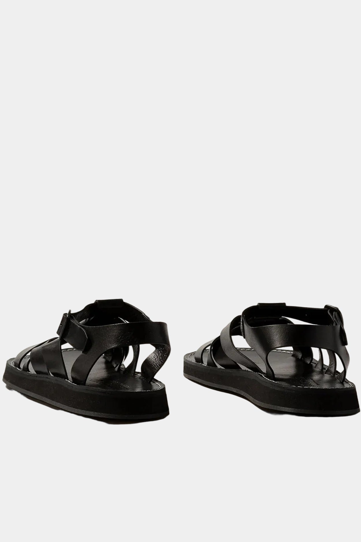 A pair of black Beltra sandals by Hereu, constructed with interwoven leather straps and a foam sole. Viewed from above