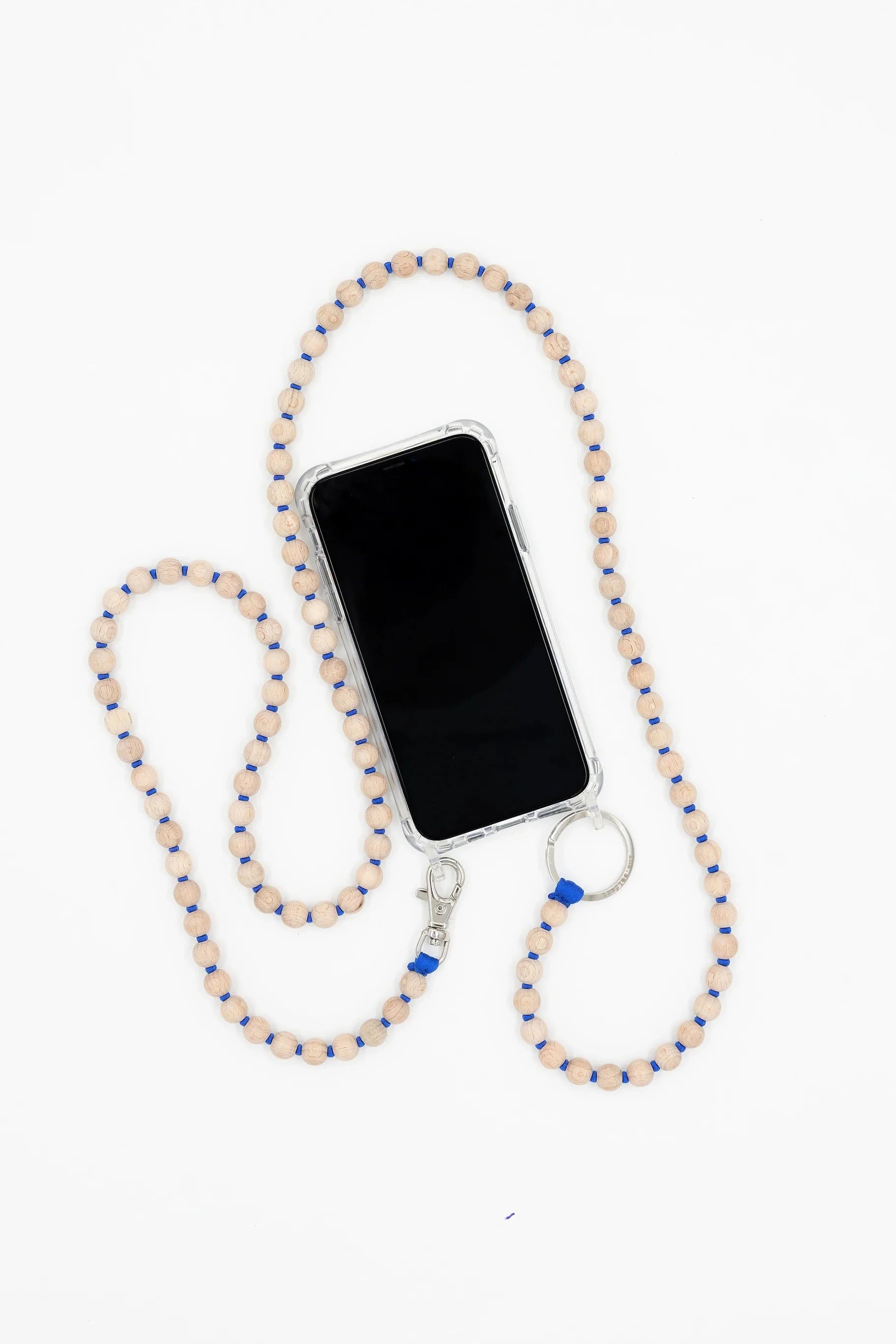 Phone case with a beaded necklace on a white background