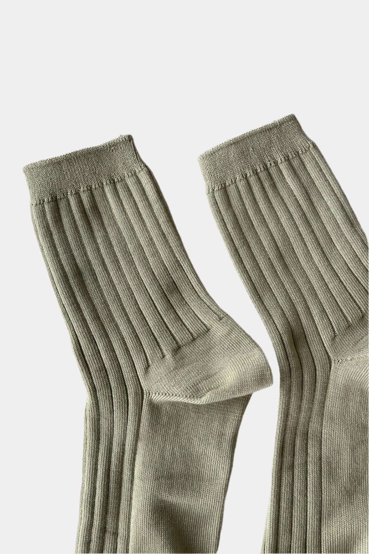 her socks in Avocado