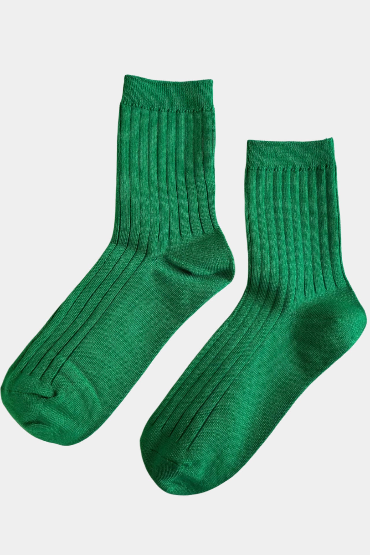 Her sock in kelly green