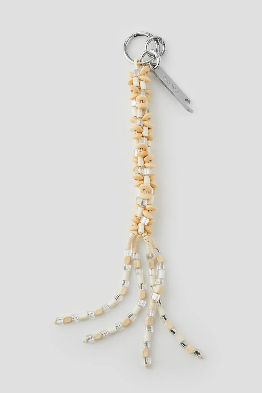 Decorative keychain with beads on a white background