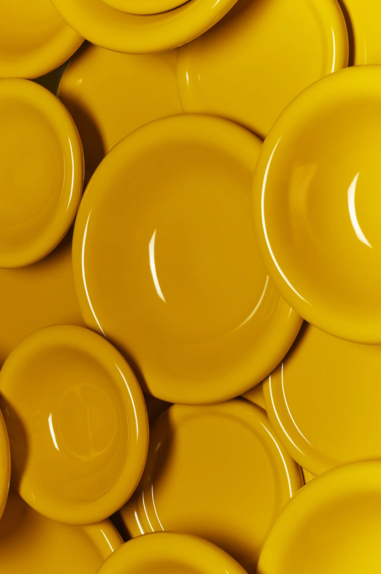Stack of yellow ceramic bowls