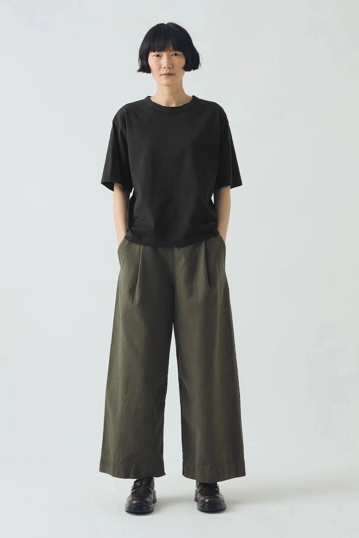 Black t-shirt on a light gray background