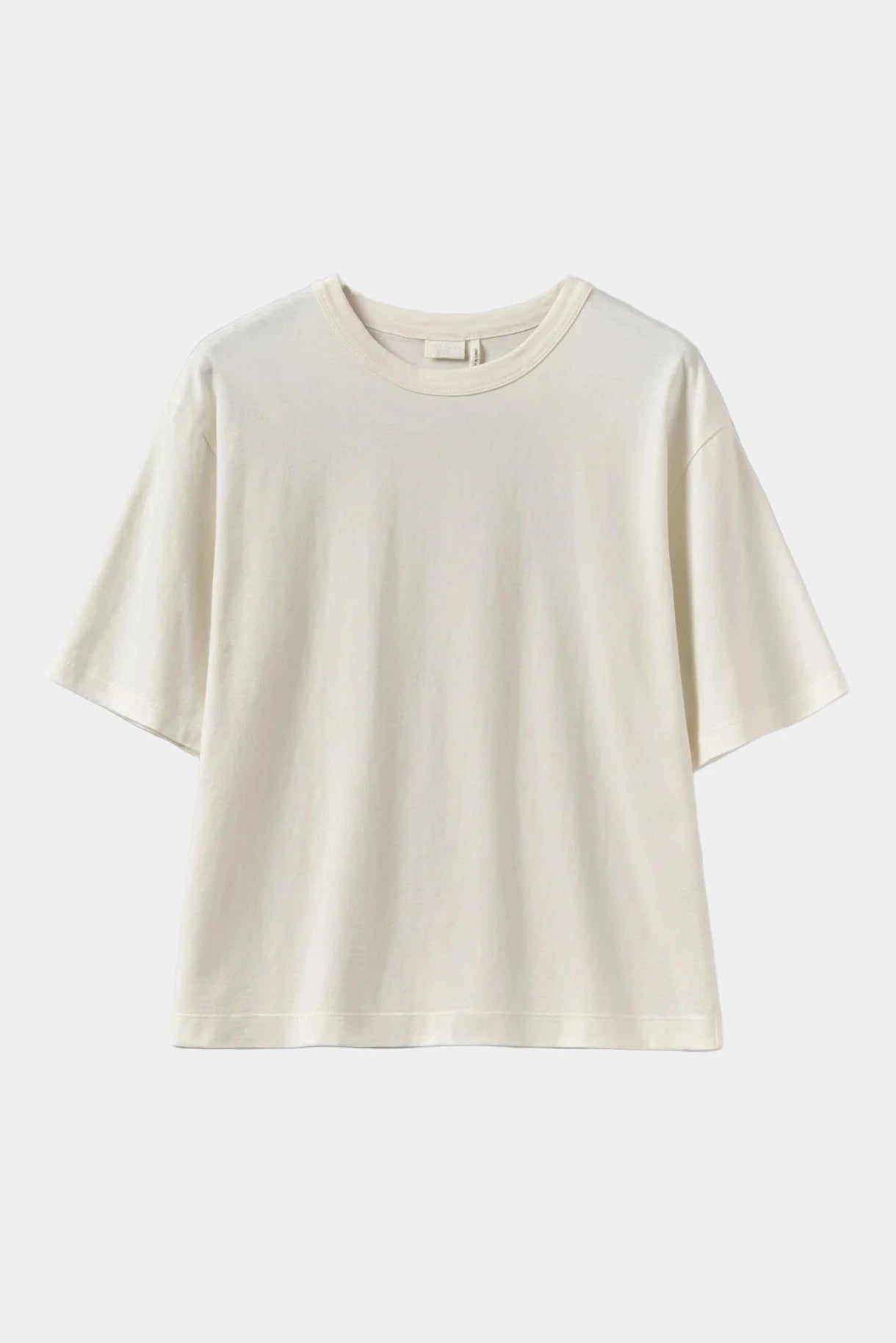 White t-shirt on a light gray background