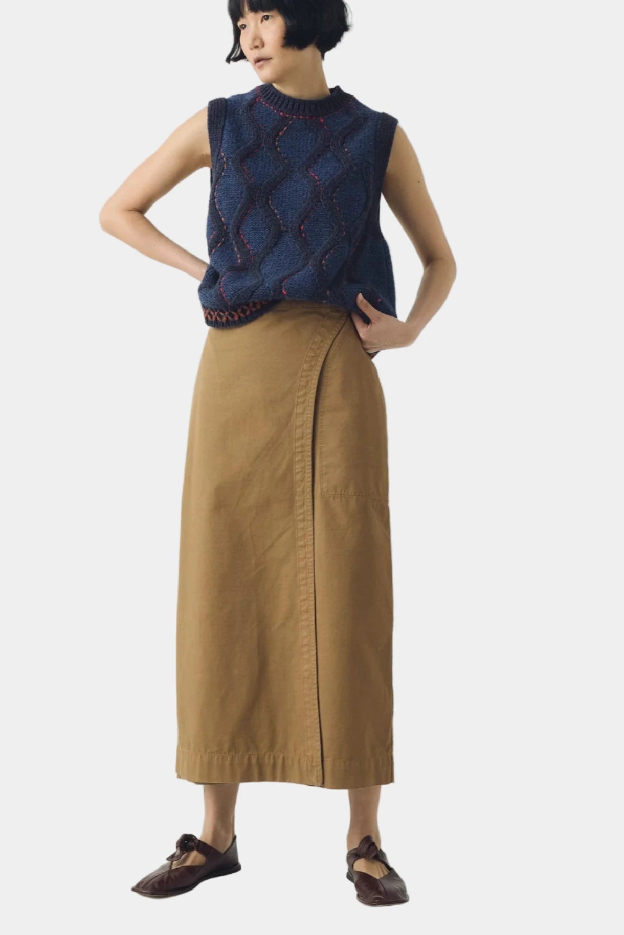 Brown skirt on a light gray background