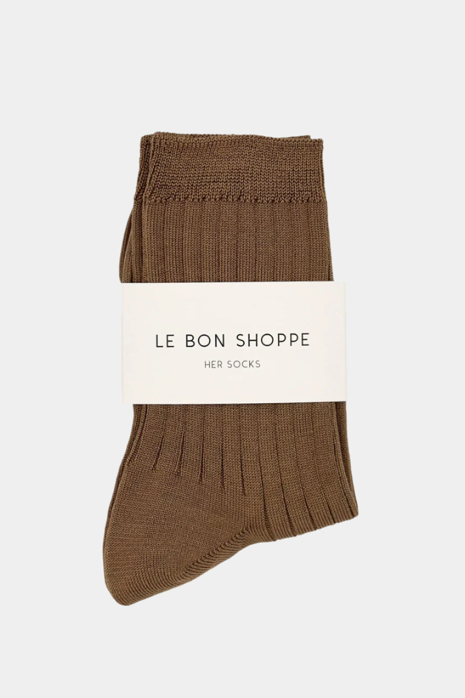 her socks in dark tan, with branding paper band