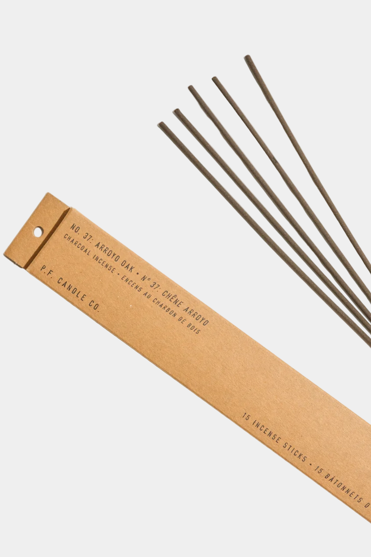 Incense sticks with a cardboard box on a white background