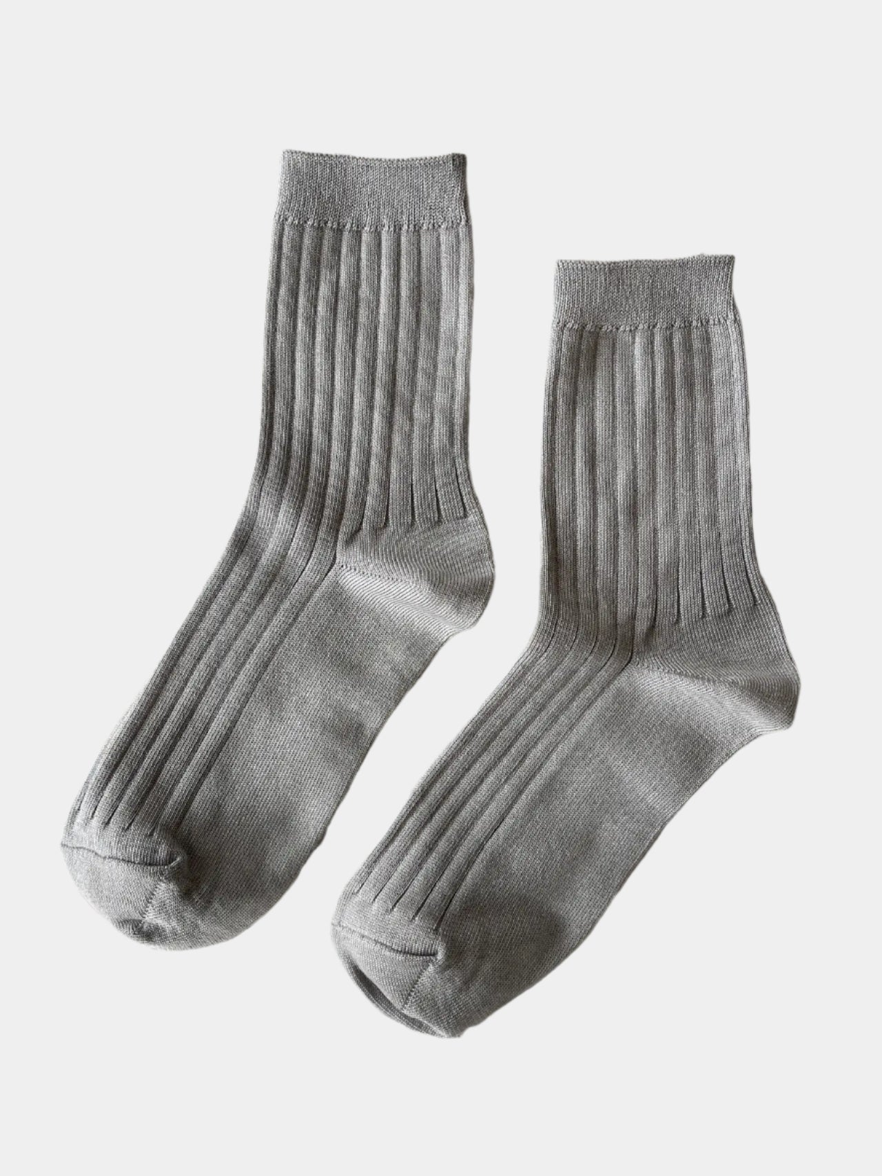 her socks in stone laying flat