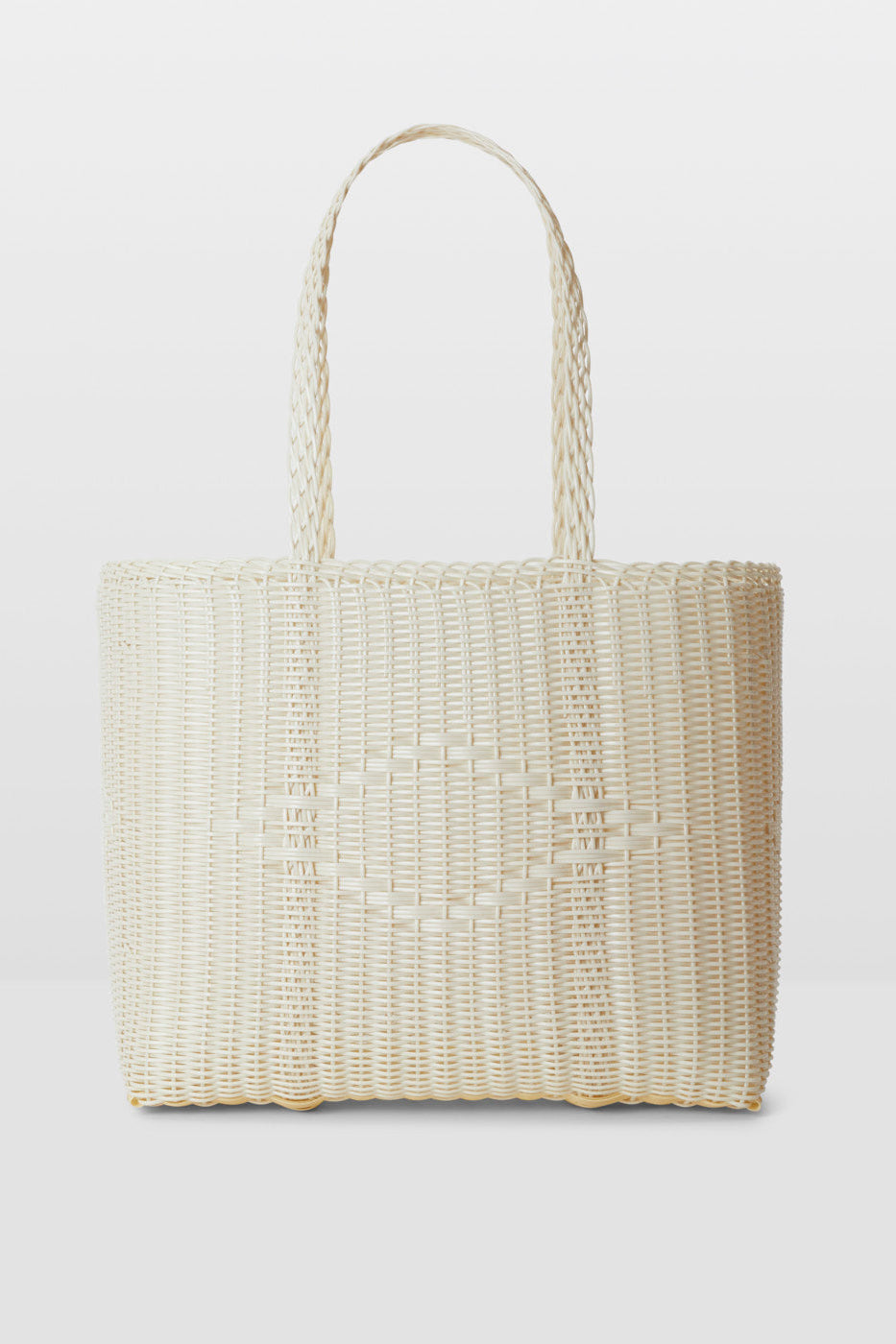 Woven tote bag on a light gray background