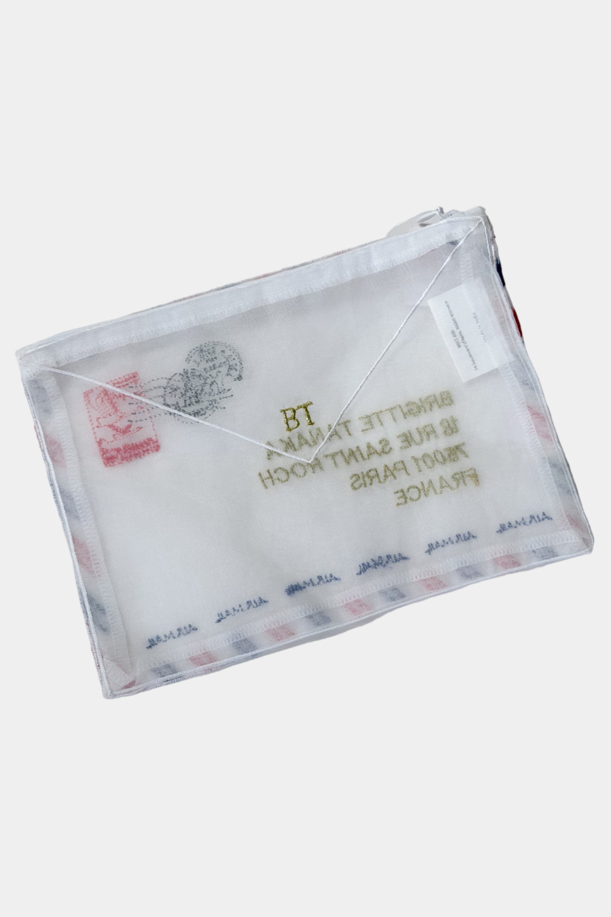 Clear organza pouch with printed text and logos on a white background