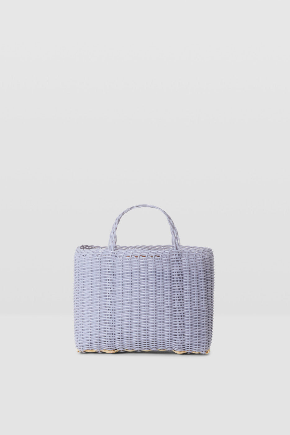Woven handbag on a light gray background