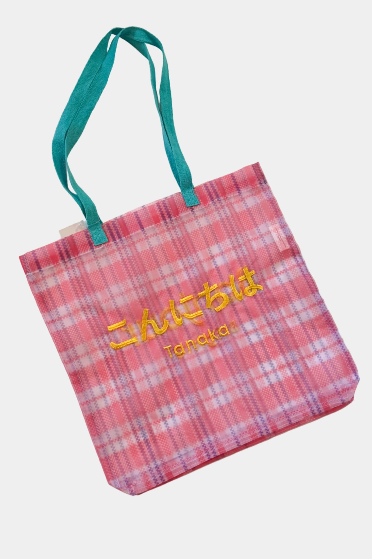 Organza Plaid tote bag with 'Bonjour' text on a white background