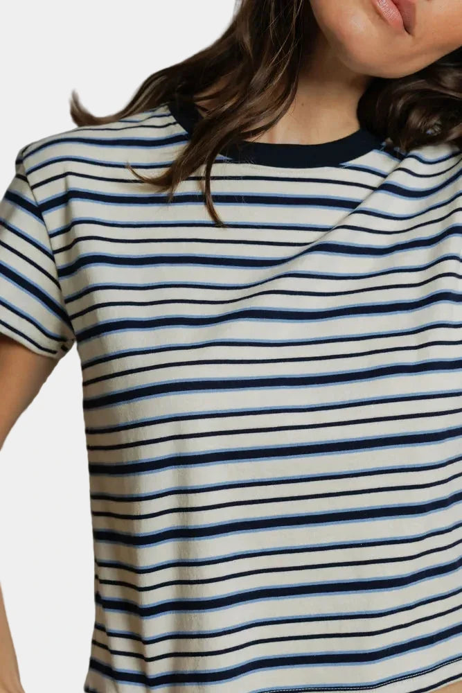Close up of a person wearing the perfect white tee dawn tee in pacific stripe - east coast general