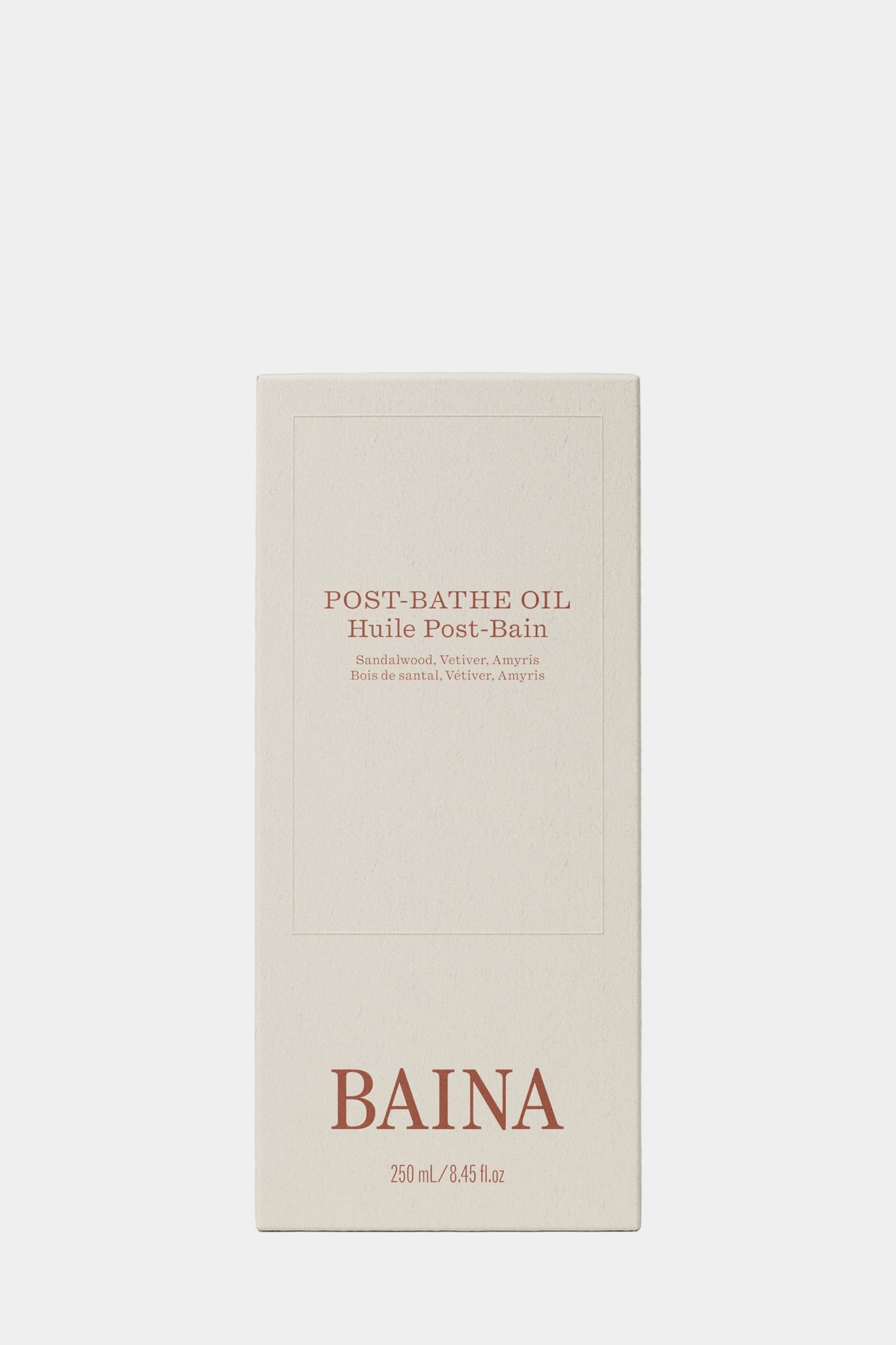 Baina post-bathe oil bottle with pump on a gray background