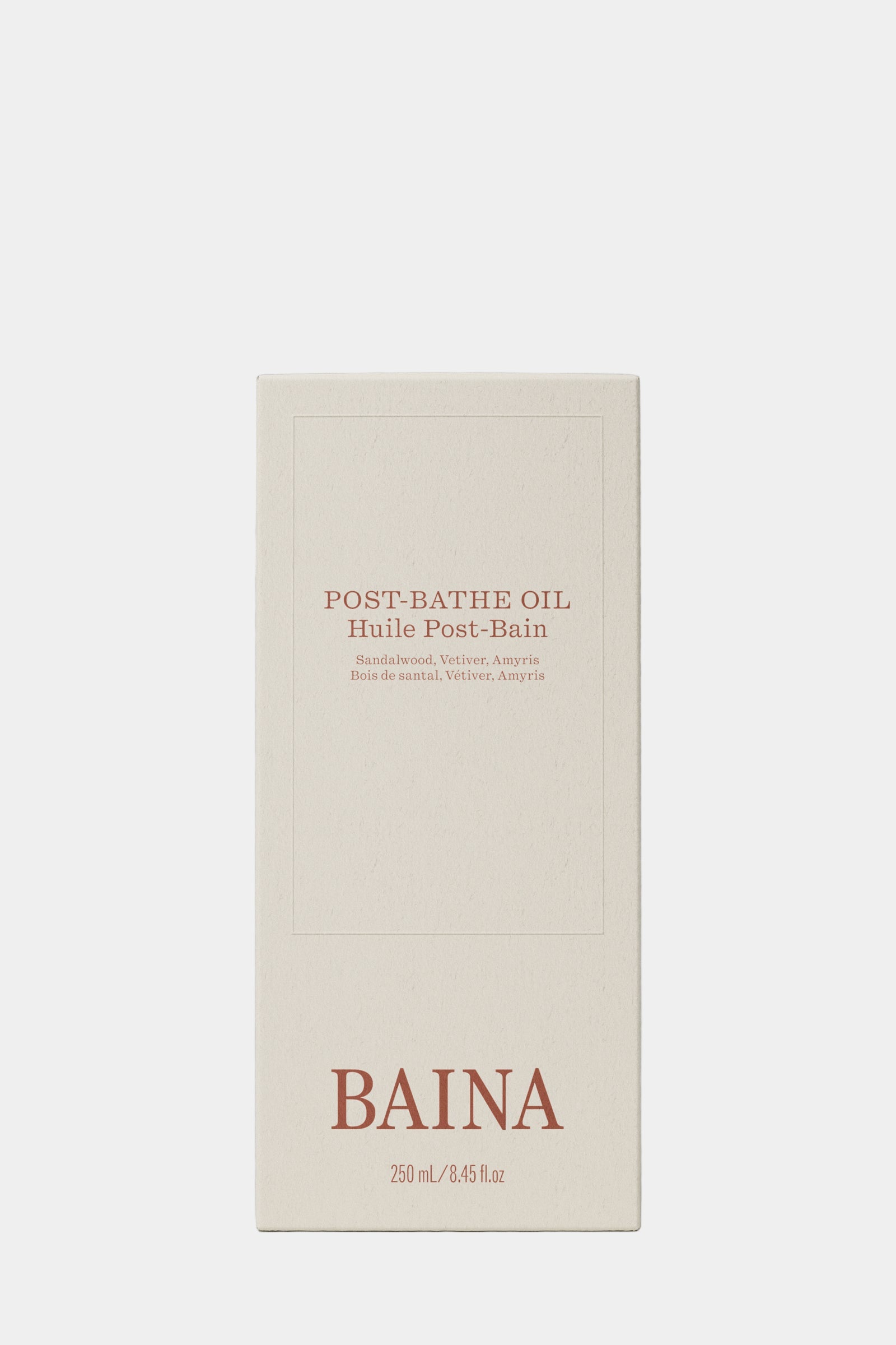 Baina post-bath oil packaging on a gray background