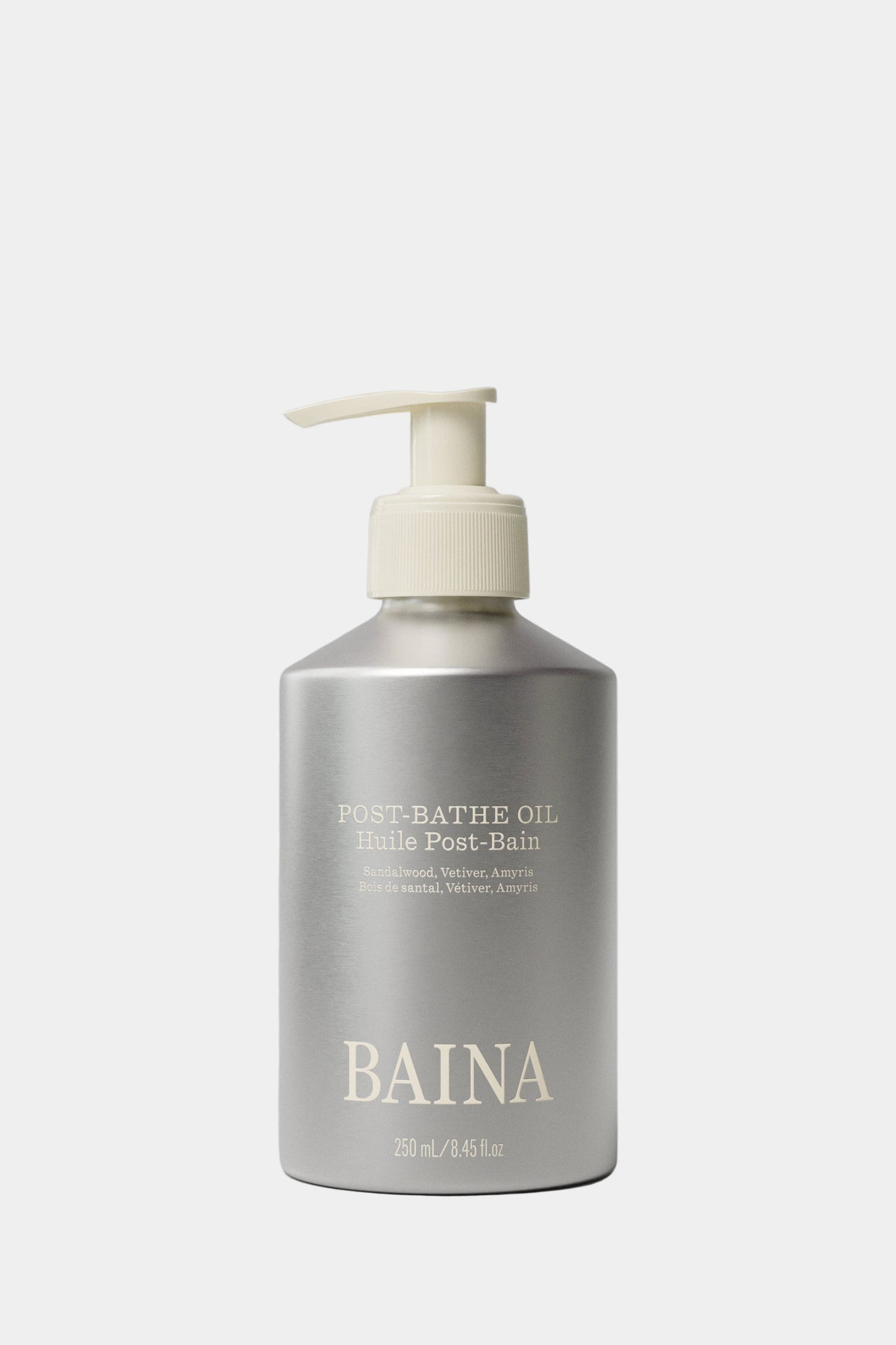 Baina post-bathe oil bottle with pump on a gray background