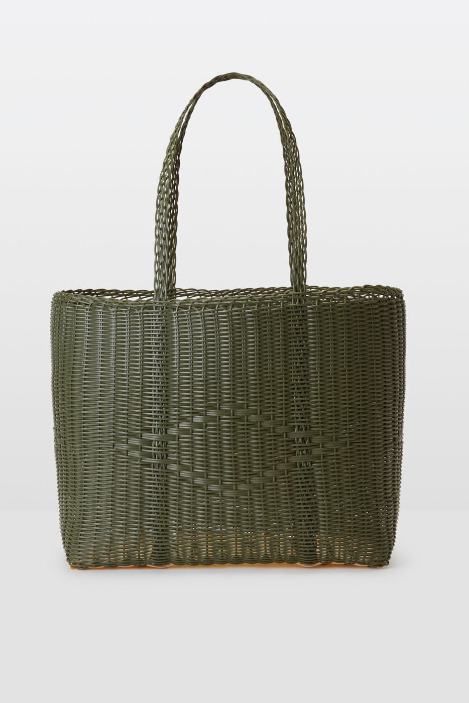 Green woven tote bag on a light gray background