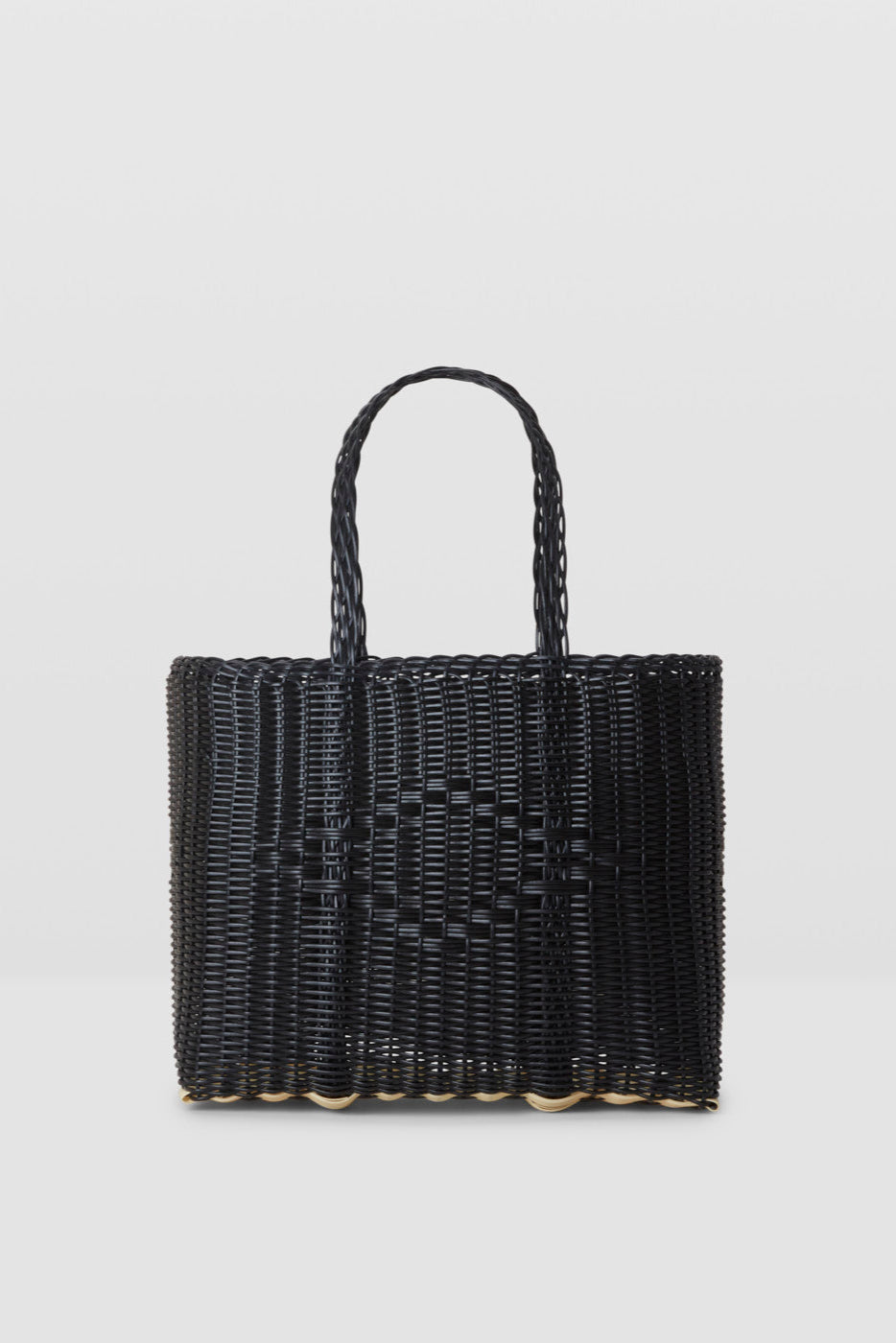Black woven handbag with handles on a light gray background