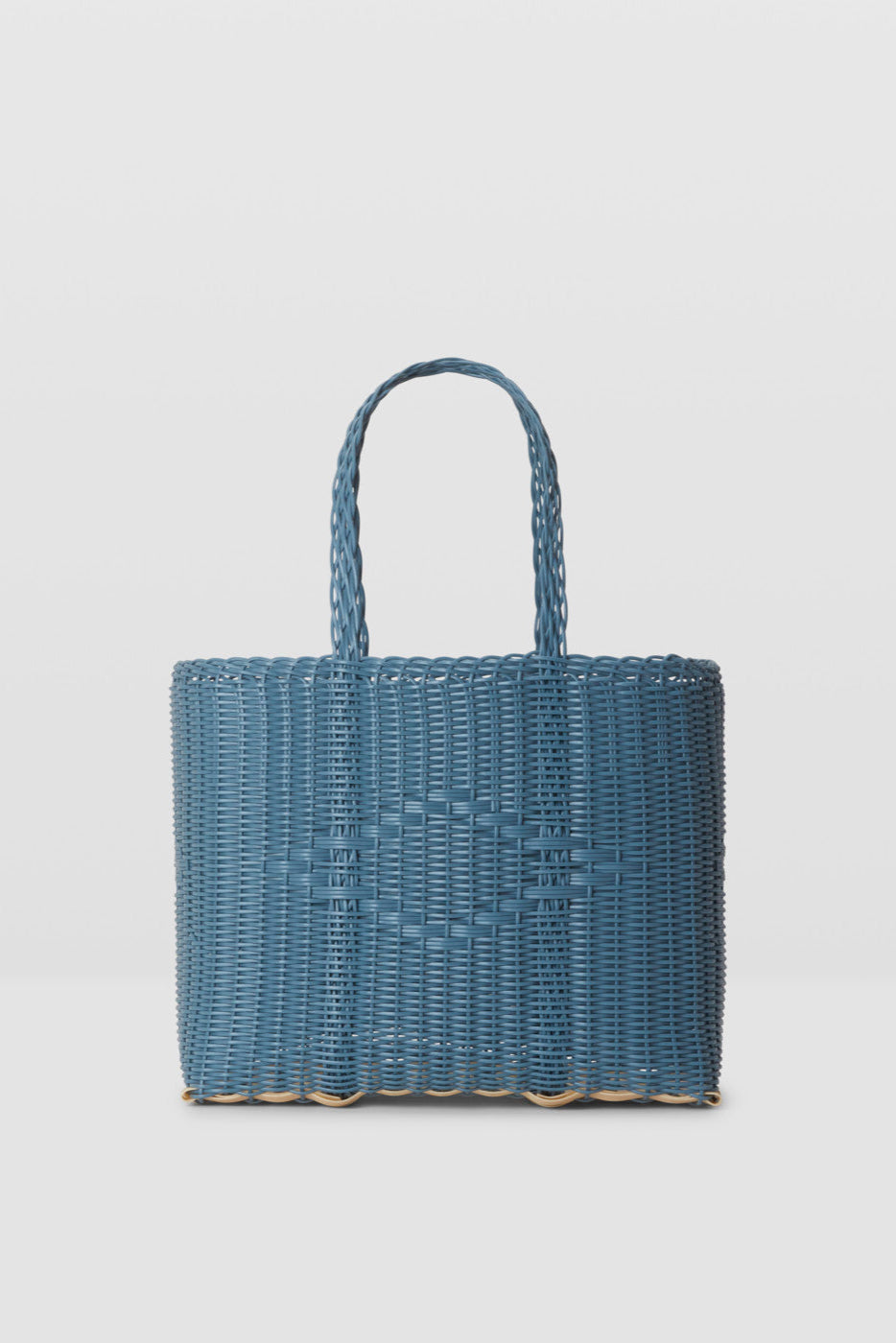 Blue woven handbag on a light gray background