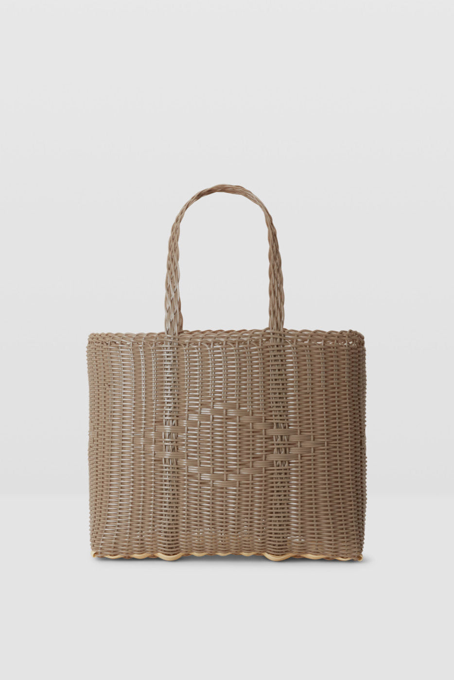 Woven handbag on a light gray background