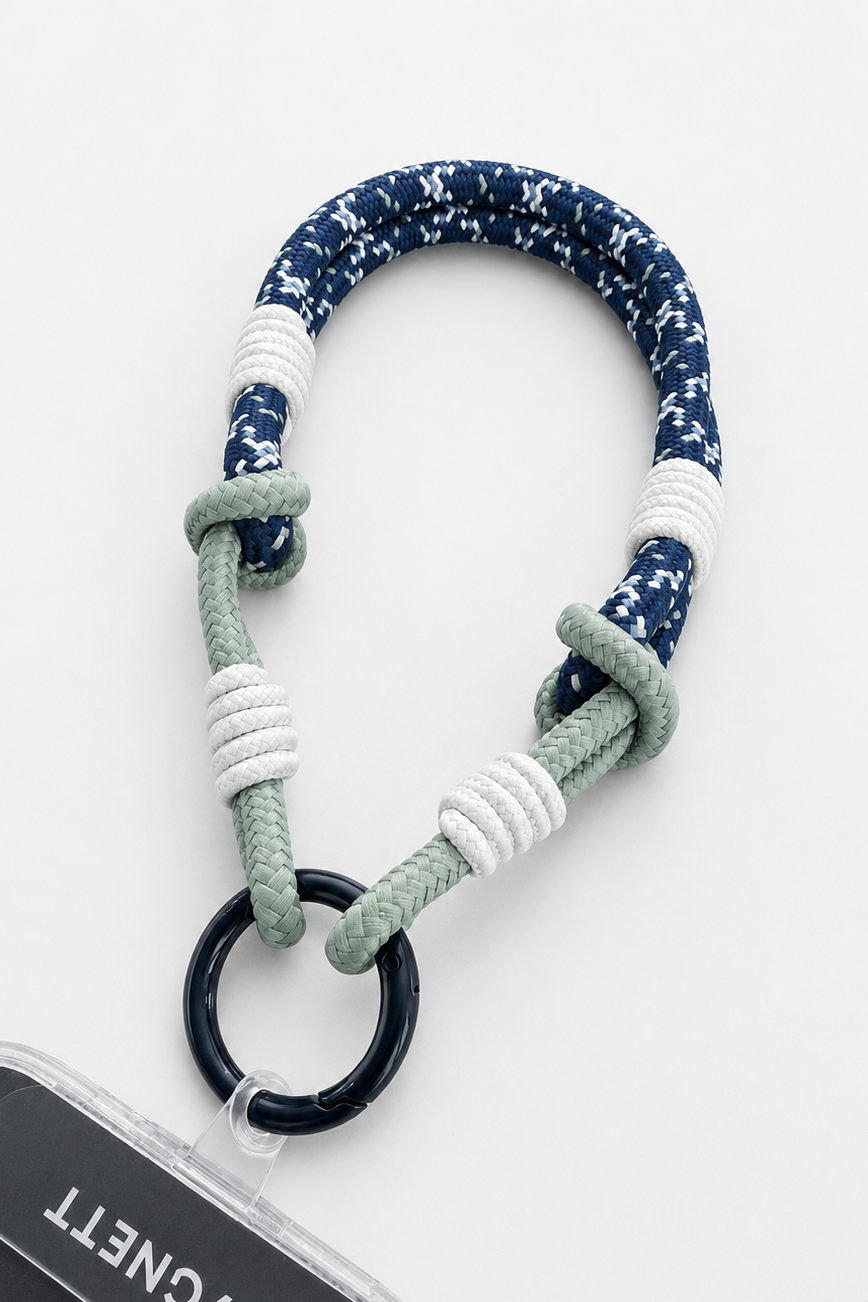 Keychain with blue and green rope, wrist phone carrier on a white background