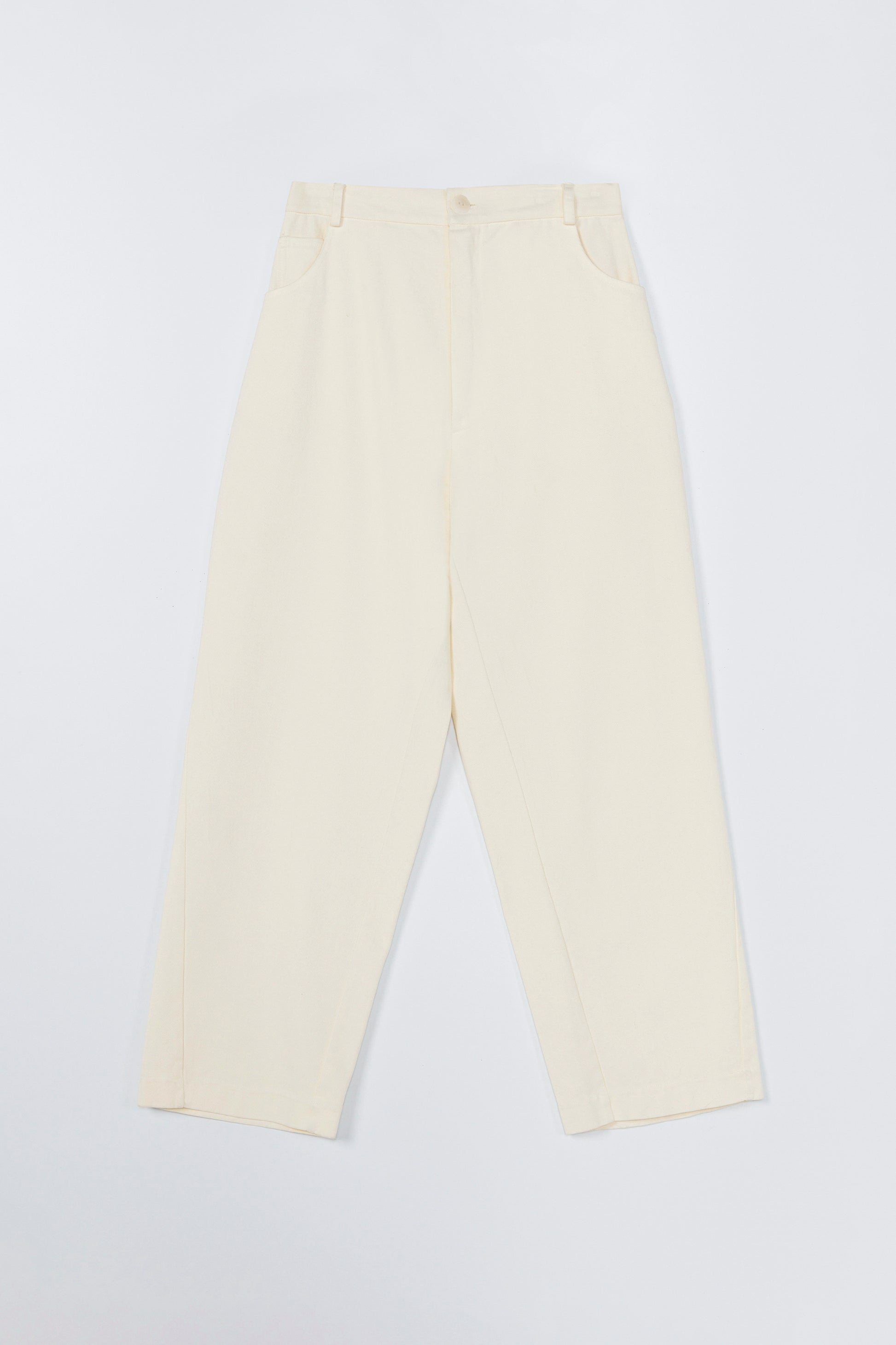 Beige pants on a light gray background