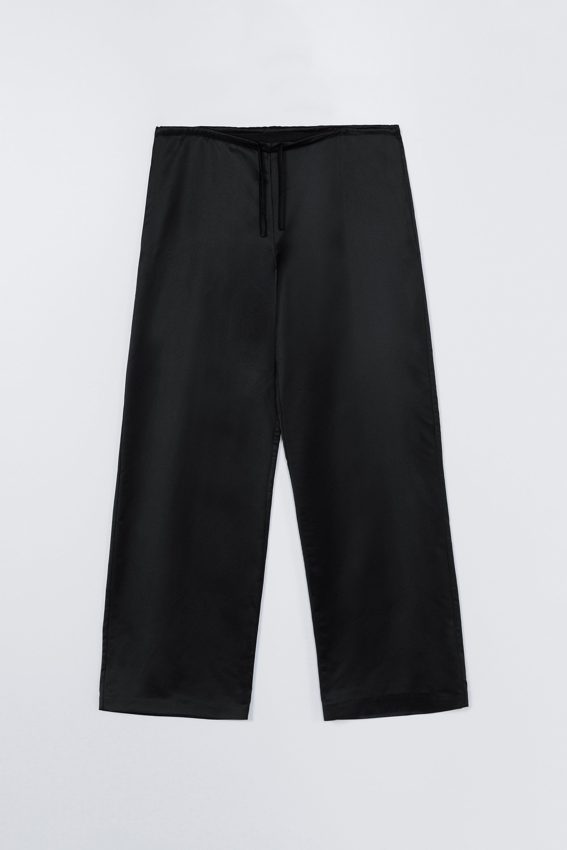 Black pants on a light gray background