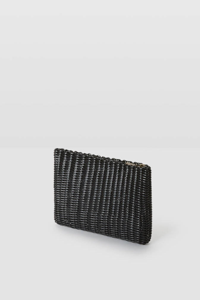 Black woven clutch on light grey background