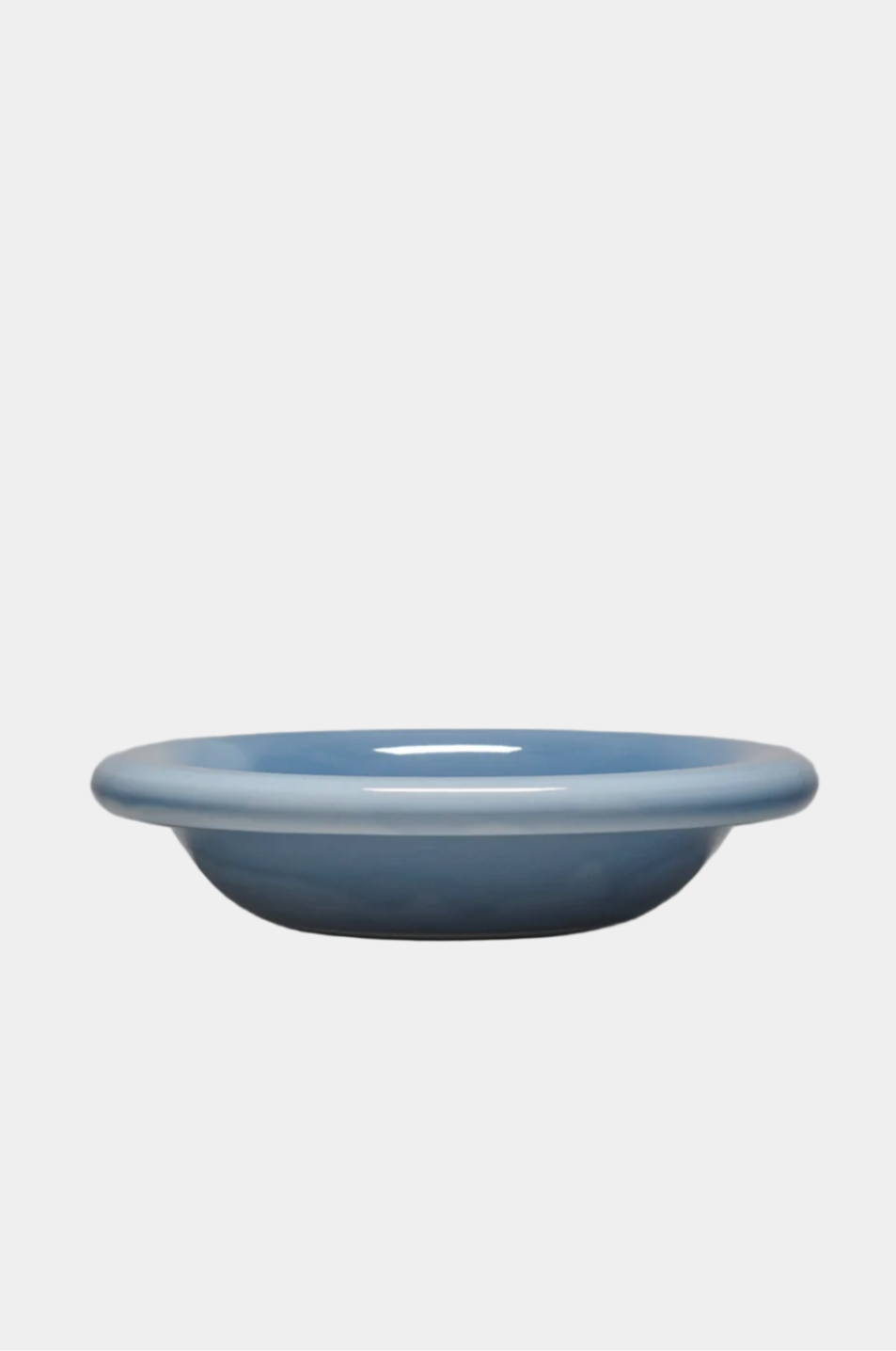 Blue ceramic dish on a white background