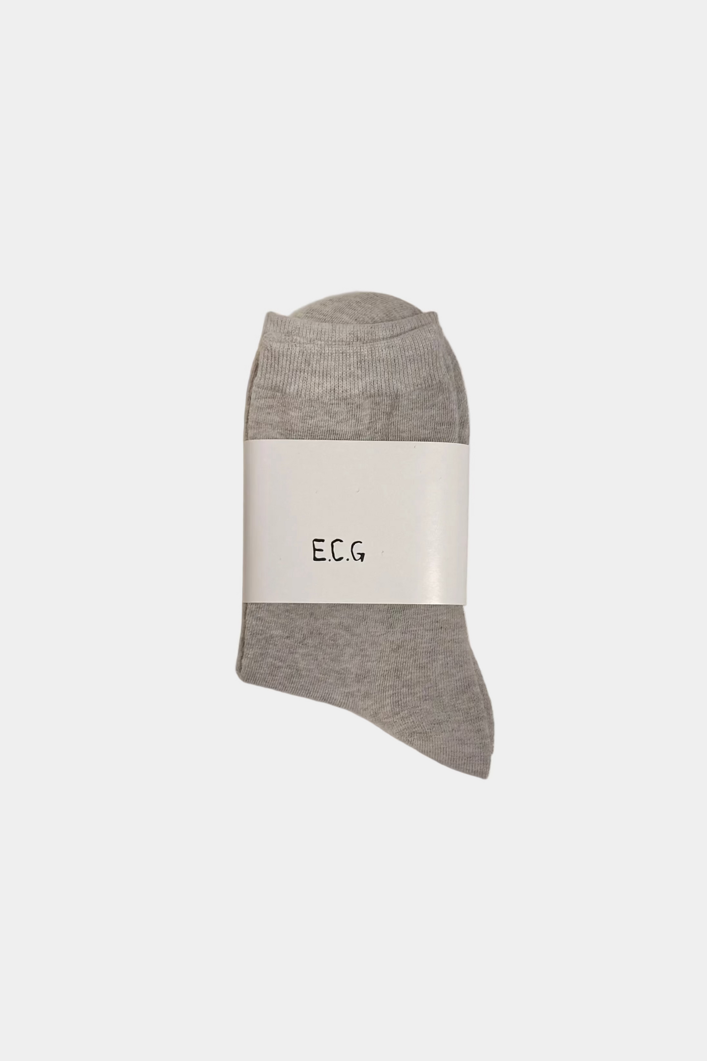 Green sock with a white E.C.G label on a plain background