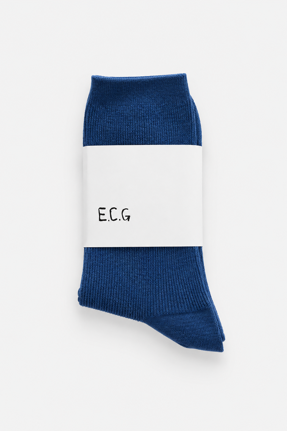 Blue cotton sock with a white label displaying 'E.C.G.' on a white background - East Coast General