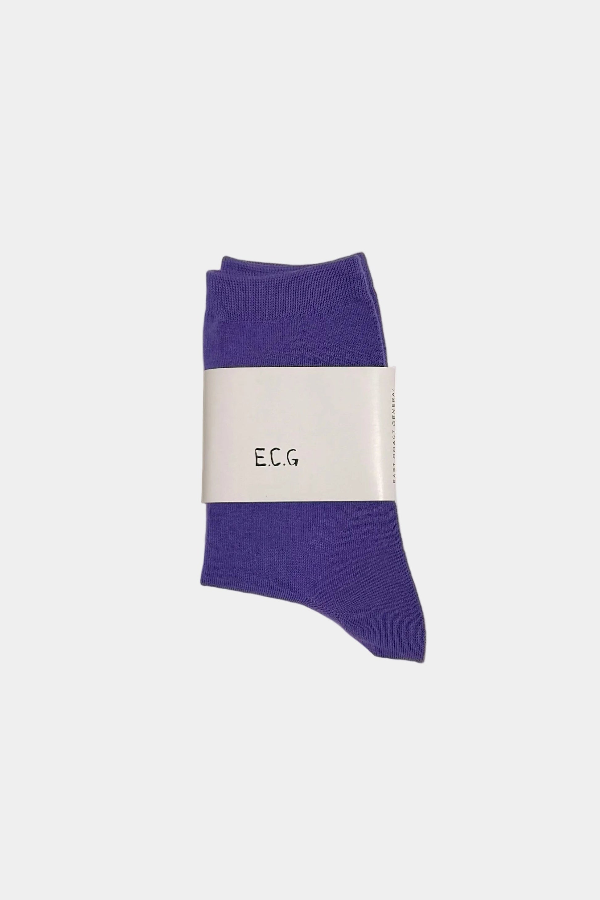 Purple sock with 'ECG' branding on a beige background