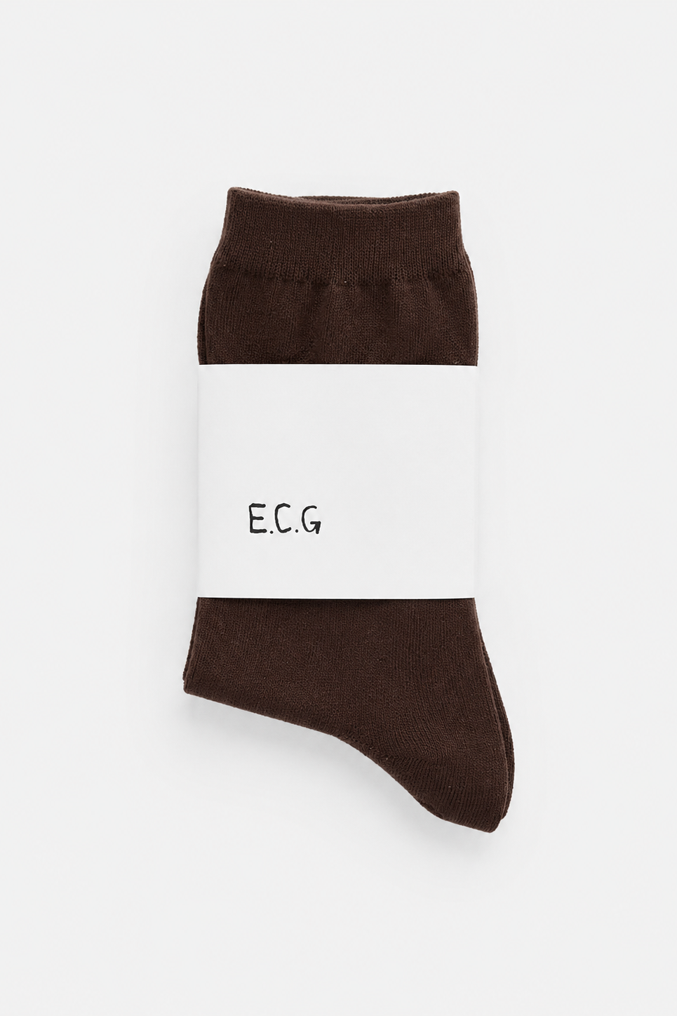 Coffee brown socks with a white band labeled E.C.G displayed on a white ack 