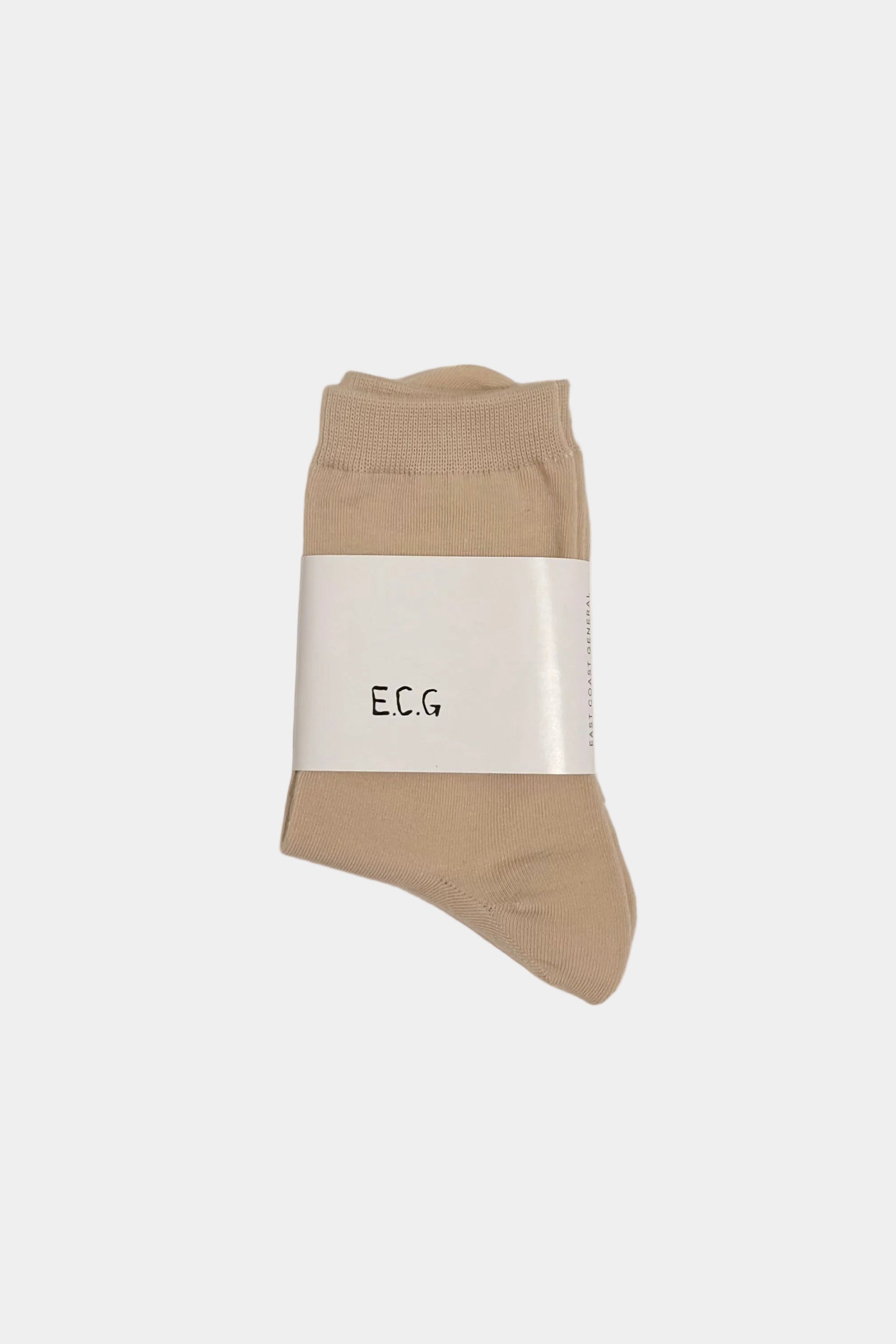 Beige sock with 'ECG' label on a light gray background