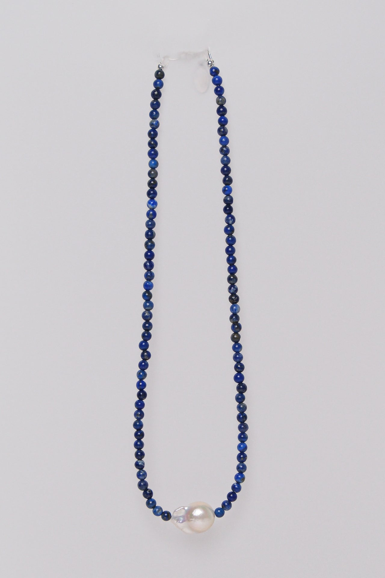 lapis beaded necklace with central single baroque pearl