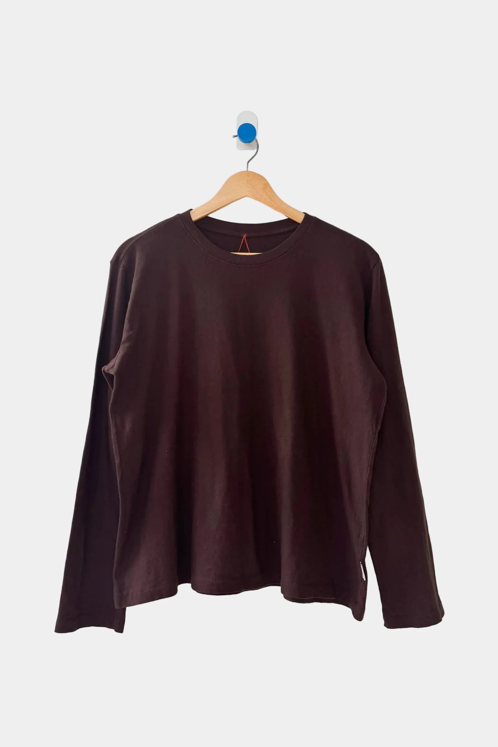 Le Bon Shoppe foundation long sleeve tee in dark cacao, displayed on a hanger - East Coast General