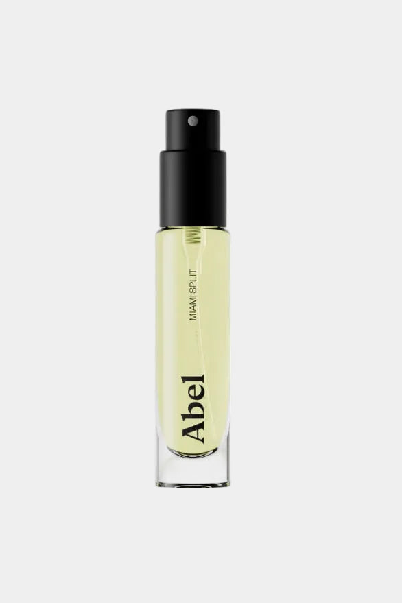 Small spray bottle labeled 'Abel' on a white background