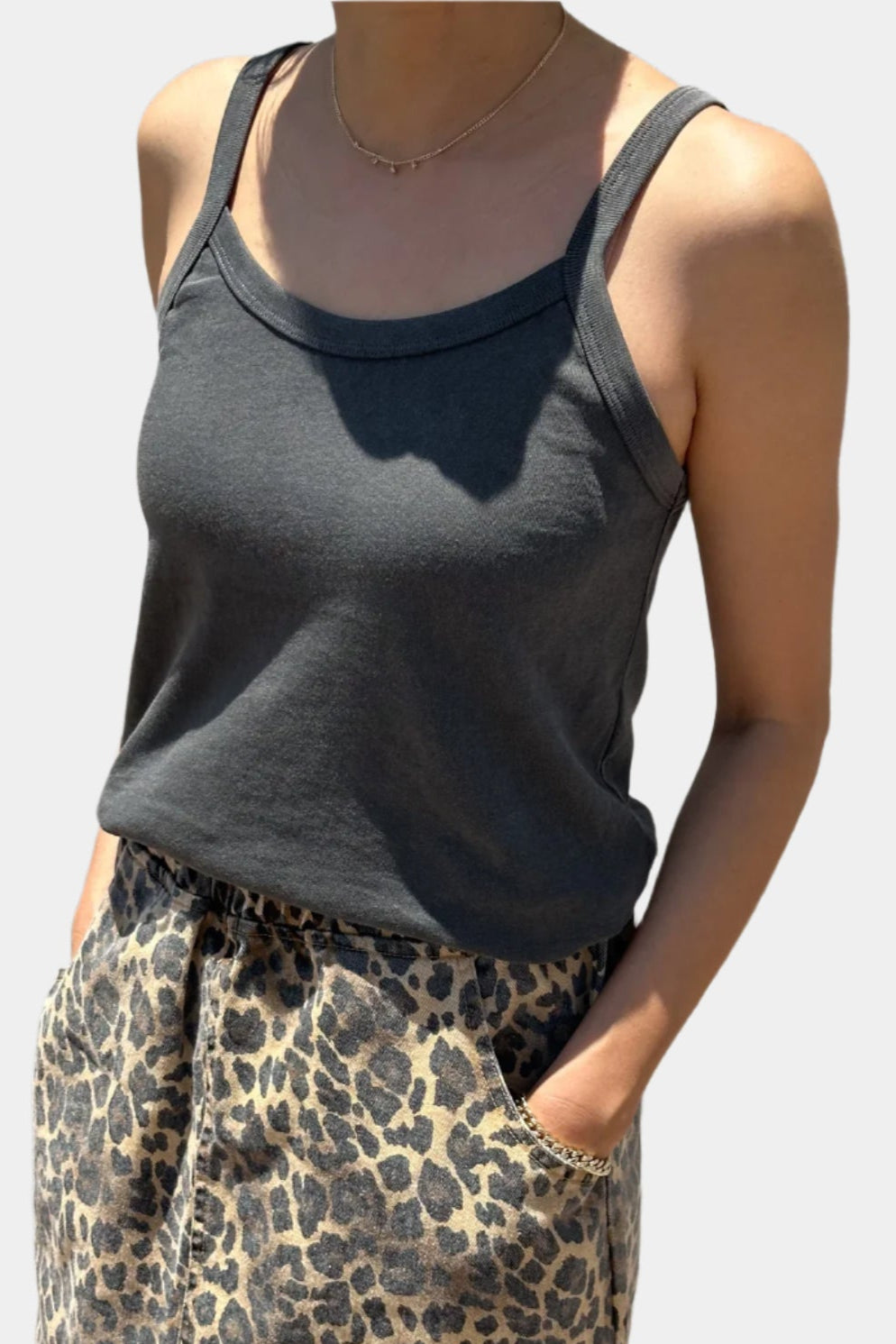 Dana tank in vintage black, styled with leopard print skirt.