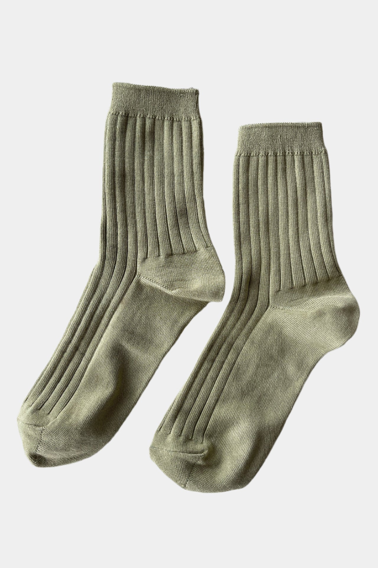 her socks in Avocado