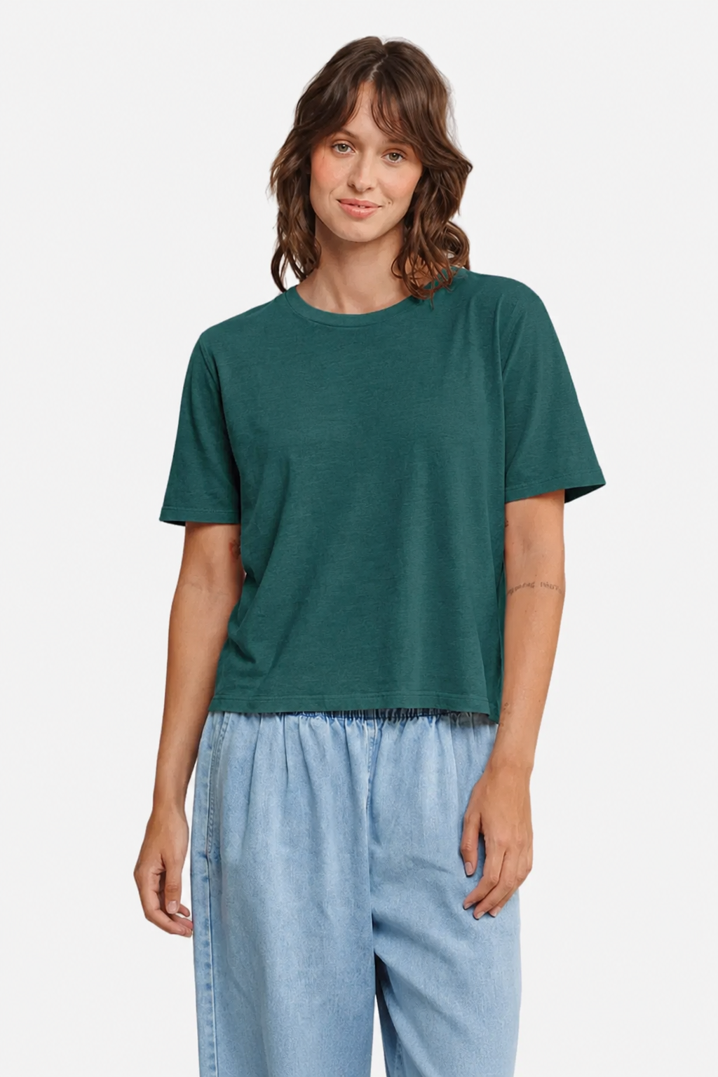 Model wearing the Jungmaven Silverlake tee in Deep Teal viewed from the front  - East Coast General