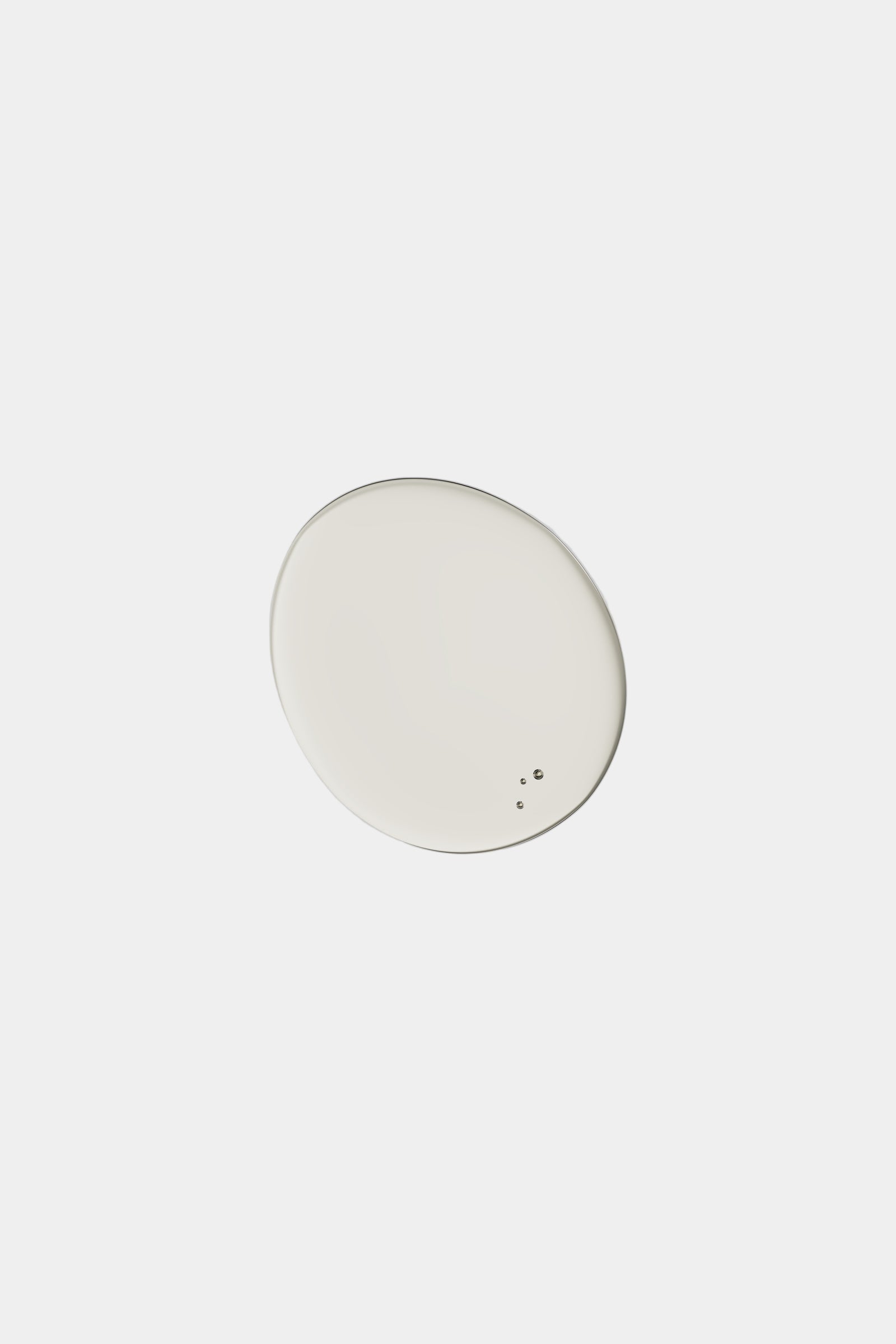 Round white object on a gray background