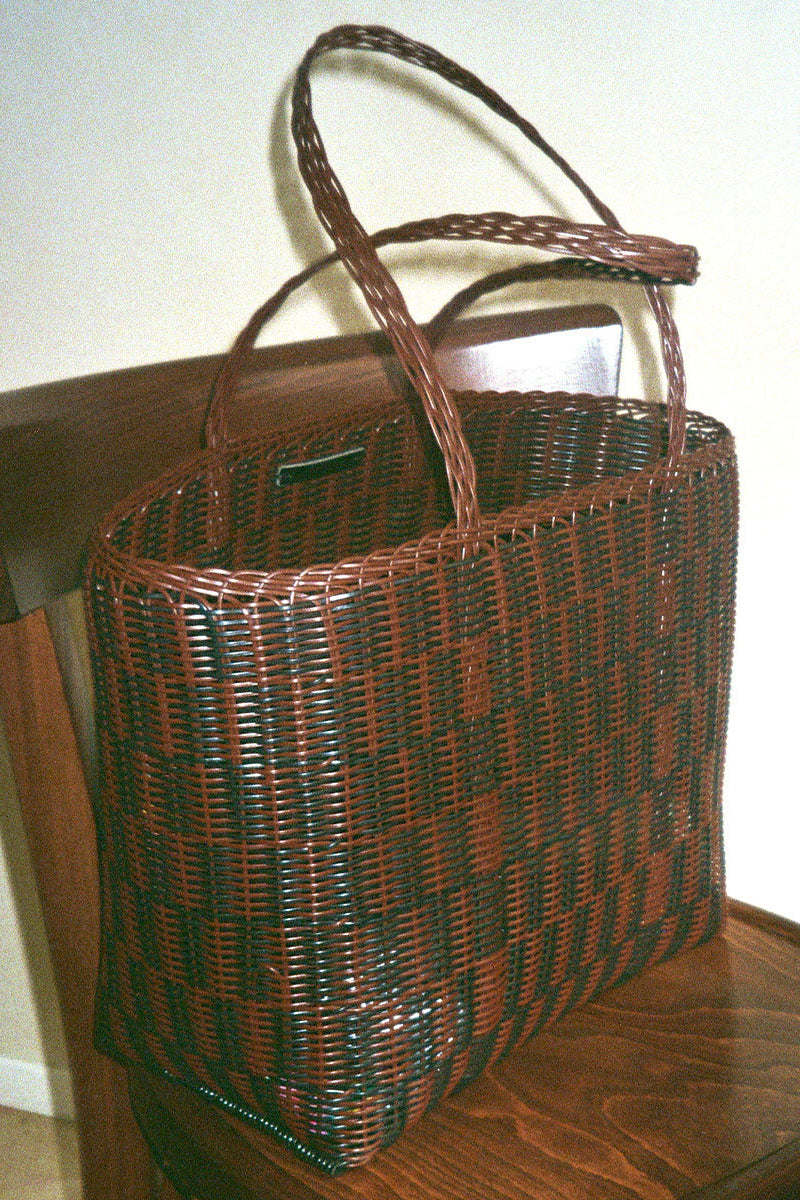 Palorosa Quadretti Medium Chocolate Black tote bag styled on wooden chair